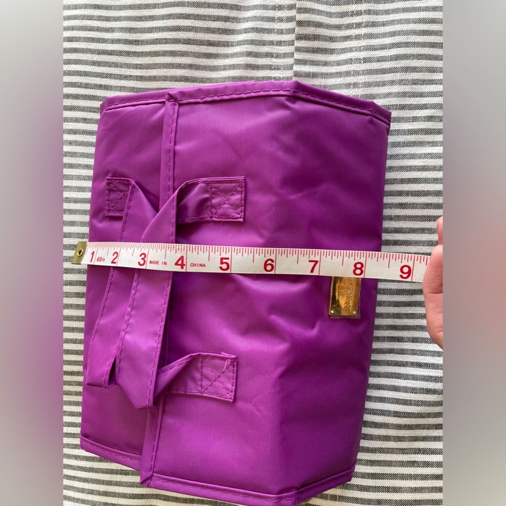 Travel case with detachable pouches